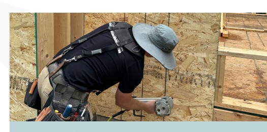 Lead carpenter framing a remodel project for Elias Construction
