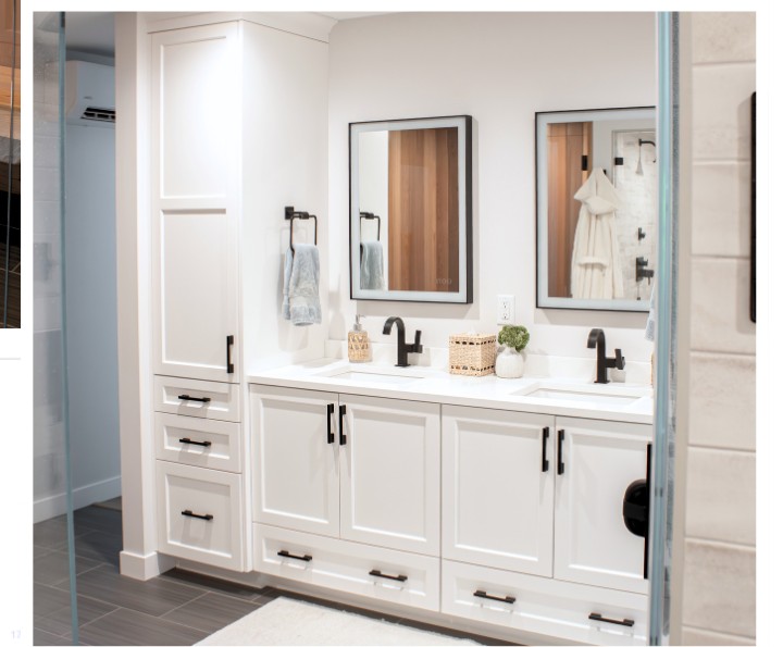 Double vanity with custom Elias cabinetry, LED-lighted mirrors, and matte black fixtures